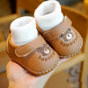 Brown leather baby walking shoes with knitted socks and happybear embroidery