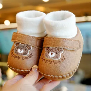 Brown leather baby walking shoes with cute bear embroidery and knitted ribbed cuffs