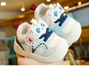 Macro detail of breathable mesh baby walking shoes with cartoon panda velcro strap