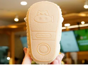 Close-up of soft non-slip rubber sole with cute cartoon pattern for winter baby shoes