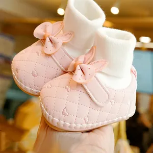 Pink soft sole baby walker shoes with quilted heart embroidery and decorative bow