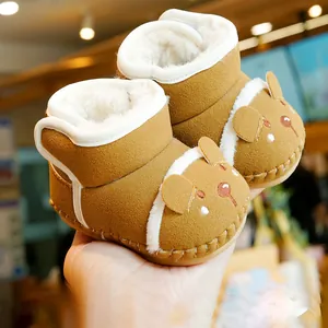 Winter baby snow boots with soft fleece lining and cute bear ear design in brown suede