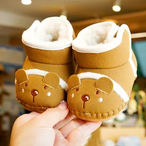 Brown infant winter boots with bear embroidery and soft fleece lining for toddlers
