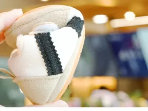 Detail showing the ultra-flexible soft sole of the baby walking shoe for easy movement