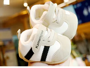 Close-up of baby winter shoes featuring warm thick fleece lining and velcro closure