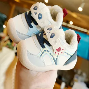 Winter infant walking shoes with fleece lining and cute panda velcro strap in beige
