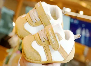 Detail of baby winter boots showing thick warm fleece lining and non-slip soft soles