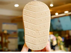 Detail of soft anti-slip rubber sole with wavy texture on winter baby snow boots