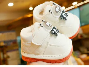 Detail of baby winter boot featuring warm plush lining and non-slip rubber sole