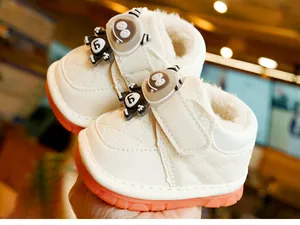 Detail of warm winter baby shoe with thick plush lining and anti-slip rubber sole