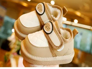 Detail showing plush faux shearling lining and anti-slip sole on winter baby boots