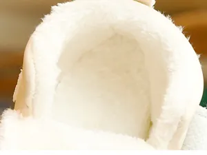Close-up of thick white faux fur lining inside baby winter boots for warmth