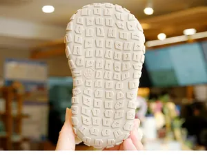 Close-up of non-slip rubber sole for toddler winter shoes with anti-skid pattern