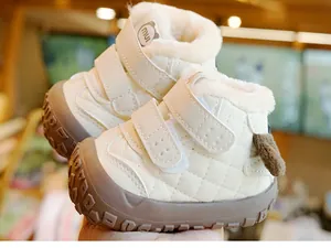 Detail of warm beige toddler winter boots with thick fleece lining and quilt texture