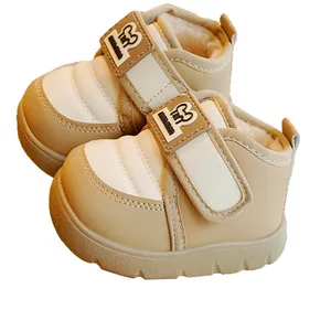 Winter toddler snow boots with warm plush lining and non-slip rubber soles in beige