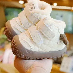Fleece-lined baby winter walking shoes with non-slip rubber soles and warm cream fur lining
