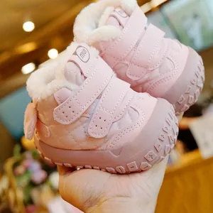 Pink winter baby boots with warm fleece lining and non-slip rubber soles for toddlers
