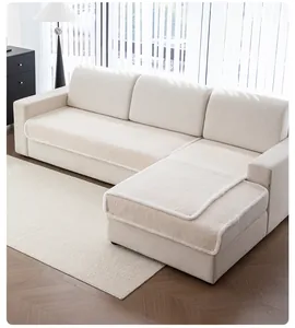 Creamy white lamb velvet sofa cover for L-shaped sectional in a modern living room
