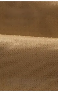 Détail du support antidérapant en silicone haute densité sur housse de canapé