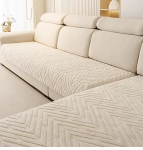 Détail de la housse de canapé crème avec texture 3D ondulée et tissu pelucheux épais