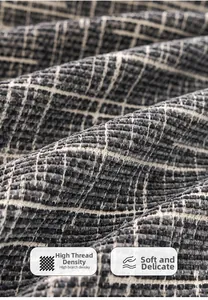 Detail of high-density grey chenille fabric with premium woven texture and soft feel