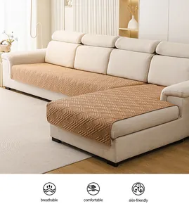 Detailansicht der kaffeebraunen Steppdecke für Sofas mit Fischgrätmuster und weichem Stoff
