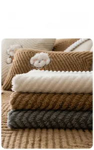 Detail view of multi-color thick fleece sofa covers with twill textured pattern
