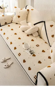 Detailed plush sofa cover set with brown heart and paw patterns on thick creamy velvet