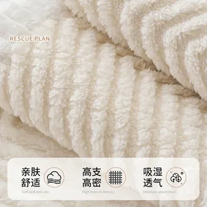 Thick plush sofa cover in cream white sherpa fleece with soft high-density texture