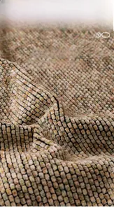Close-up of heavy chenille fabric showing artistic woven texture and multi-color fibers