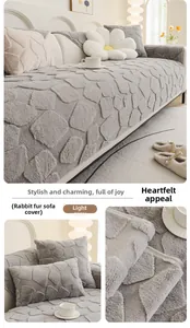 Detail of light grey rabbit faux fur sofa mat with non-slip 3D pebble texture
