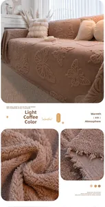 Macro detail of butterfly embossed coral fleece sofa cover with elegant fringe edges