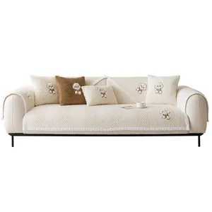 Cartoon dog embroidered herringbone sofa cover set in cream white and brown plush fabric