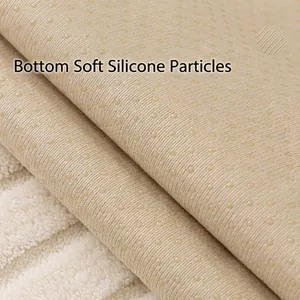 Thickened plush sofa cushion with non-slip soft silicone particles on the bottom surface