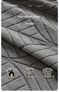 Macro detail of grey polar fleece sofa cover with 3D leaf jacquard texture fabric