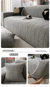 Detail of dark grey polar fleece sofa cover featuring a textured leaf vein pattern fabric