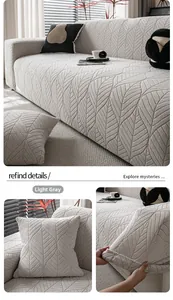 Detail of light grey sofa cover featuring 3D leaf texture and thick knitted fabric