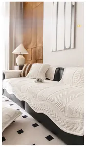 Detail view of heavyweight chenille sofa cover with wavy textures in beige color