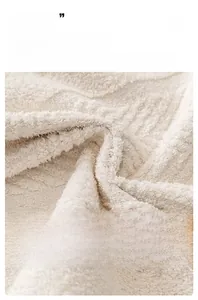 Close-up of thick beige chenille fabric showing dense texture and breathable weave
