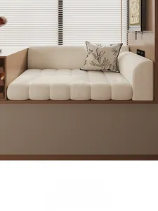 Detail view of beige teddy fleece bay window mat with vertical stitching and armrest