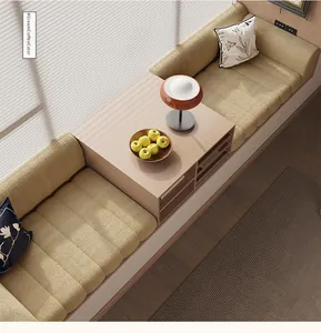 Close-up of creamy coffee teddy velvet bay window mat with a wooden storage side table