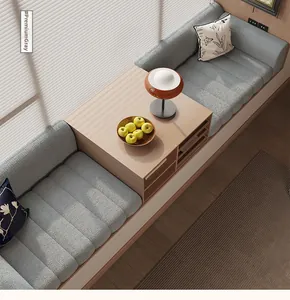 Detail of premium grey teddy fleece bay window cushions with a center wooden storage table