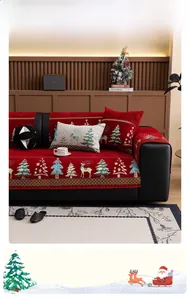 Close-up of festive red Chenille sofa cushion with snowflake embroidery and fringe
