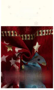 Close-up of thick red Chenille Christmas sofa cover with woven stars and trees