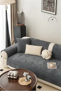 Detailed view of dark gray chenille sofa cover with soft ribbed corduroy texture