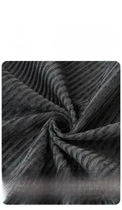 Detailed view of high-density gray chenille fabric showing soft ribbed texture and quality