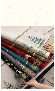 Detailed view of stackable Christmas chenille sofa cushions with reindeer and tree patterns