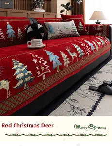 Detail showing red Christmas chenille sofa cover with festive reindeer and tree patterns