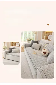 Close-up of soft light grey chenille sofa cover with textured waffle weave pattern