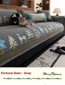 Detail of Christmas chenille sofa cushion in grey with lucky deer and tree patterns